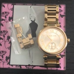 Micheal Kors gold watch